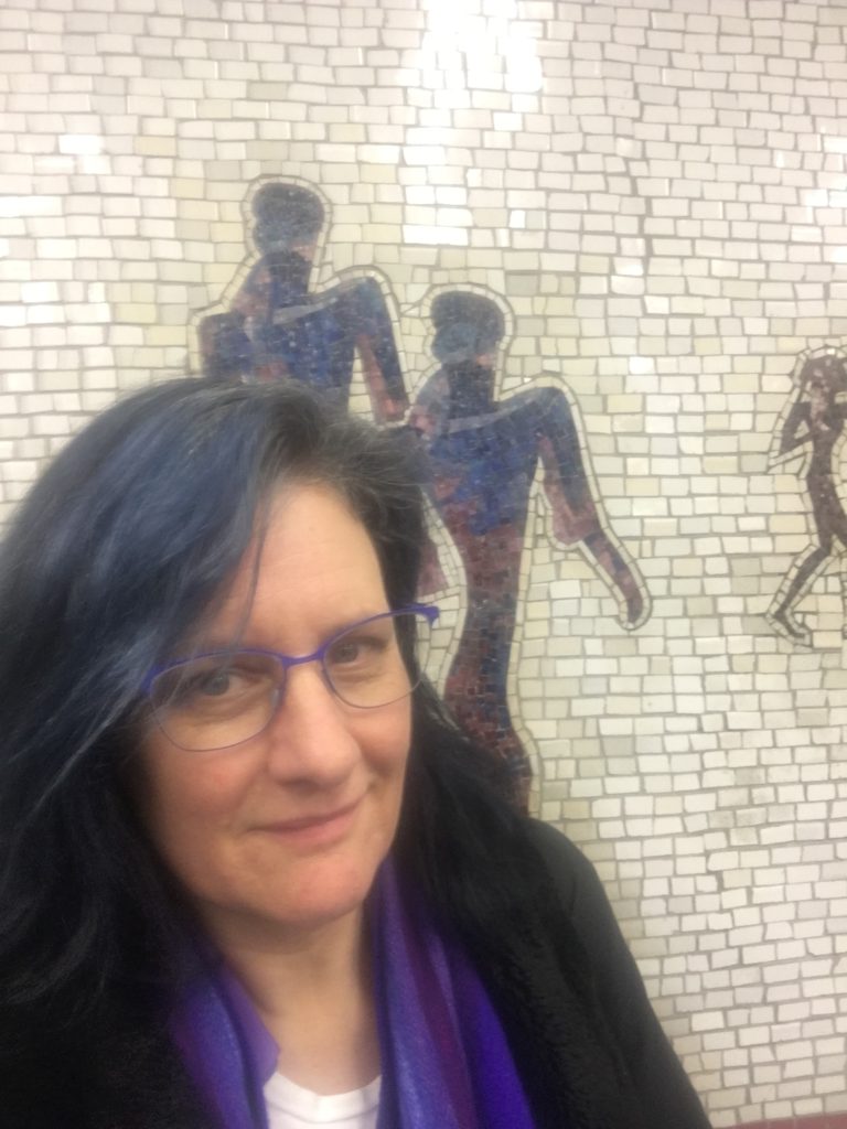 blue hair matching NYC subway tile art