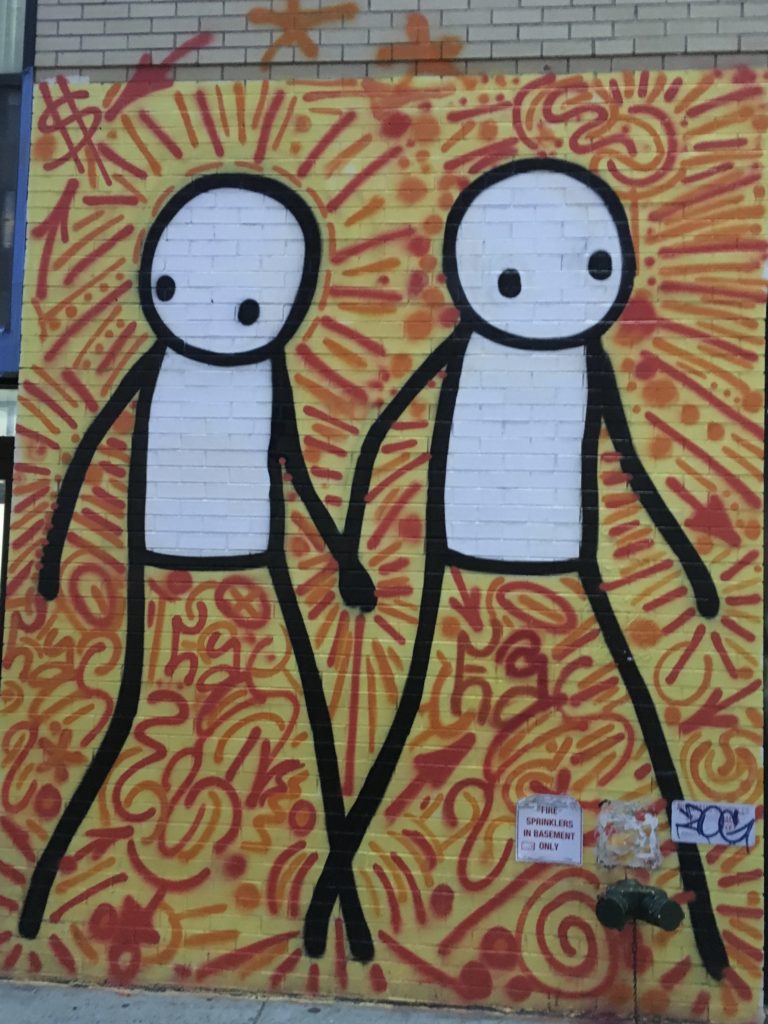 street art of 2 stick figures