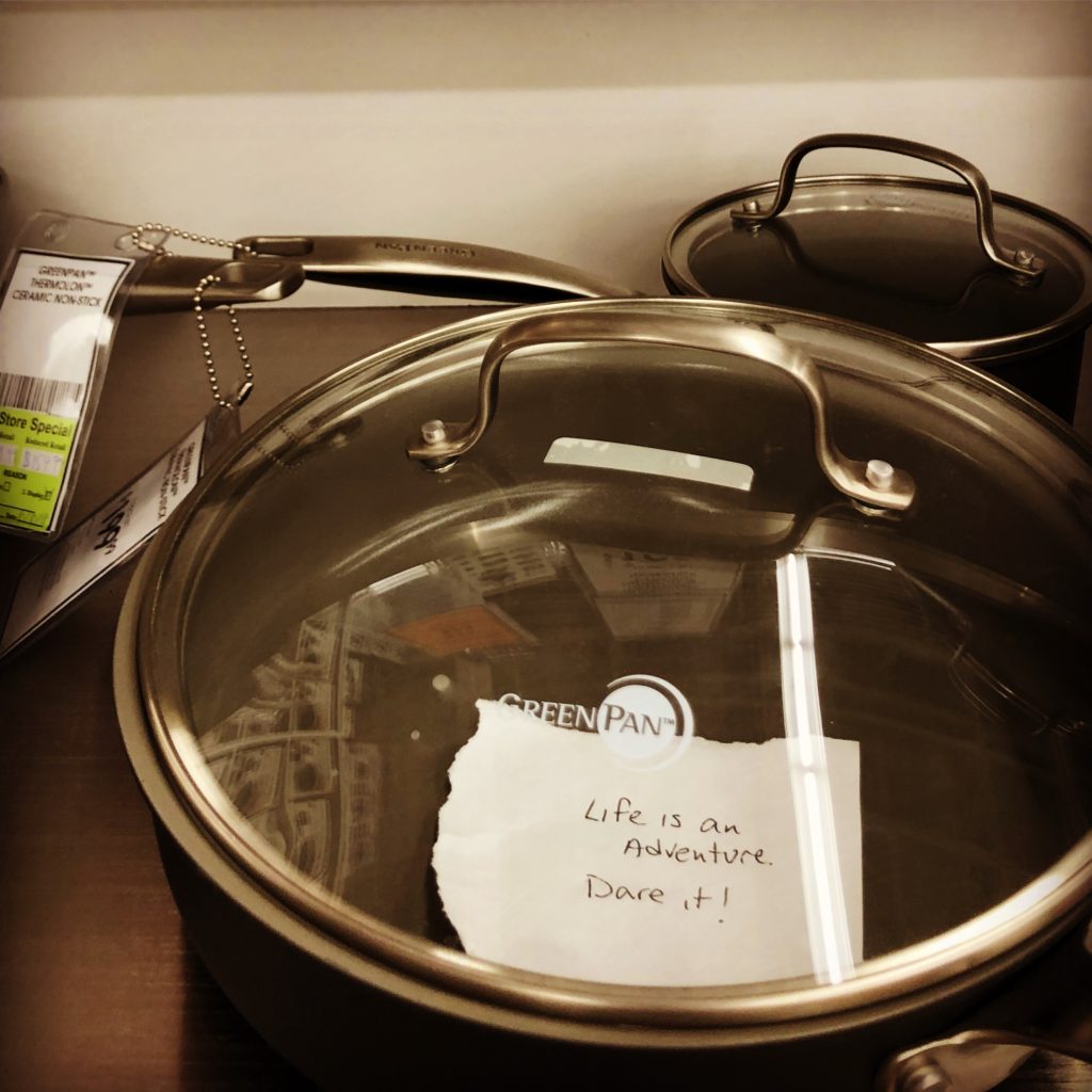 hand written note inside cooking pot at a store