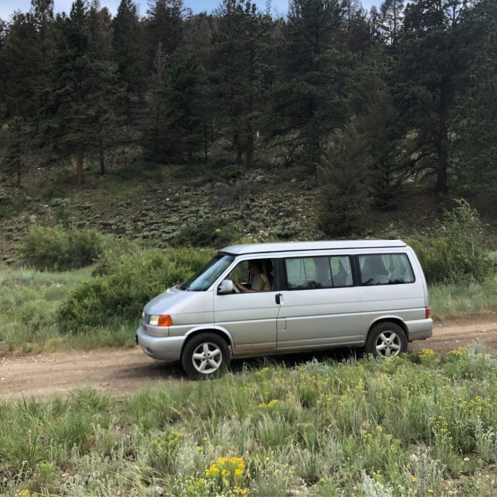 European camper on a dirt mountain road