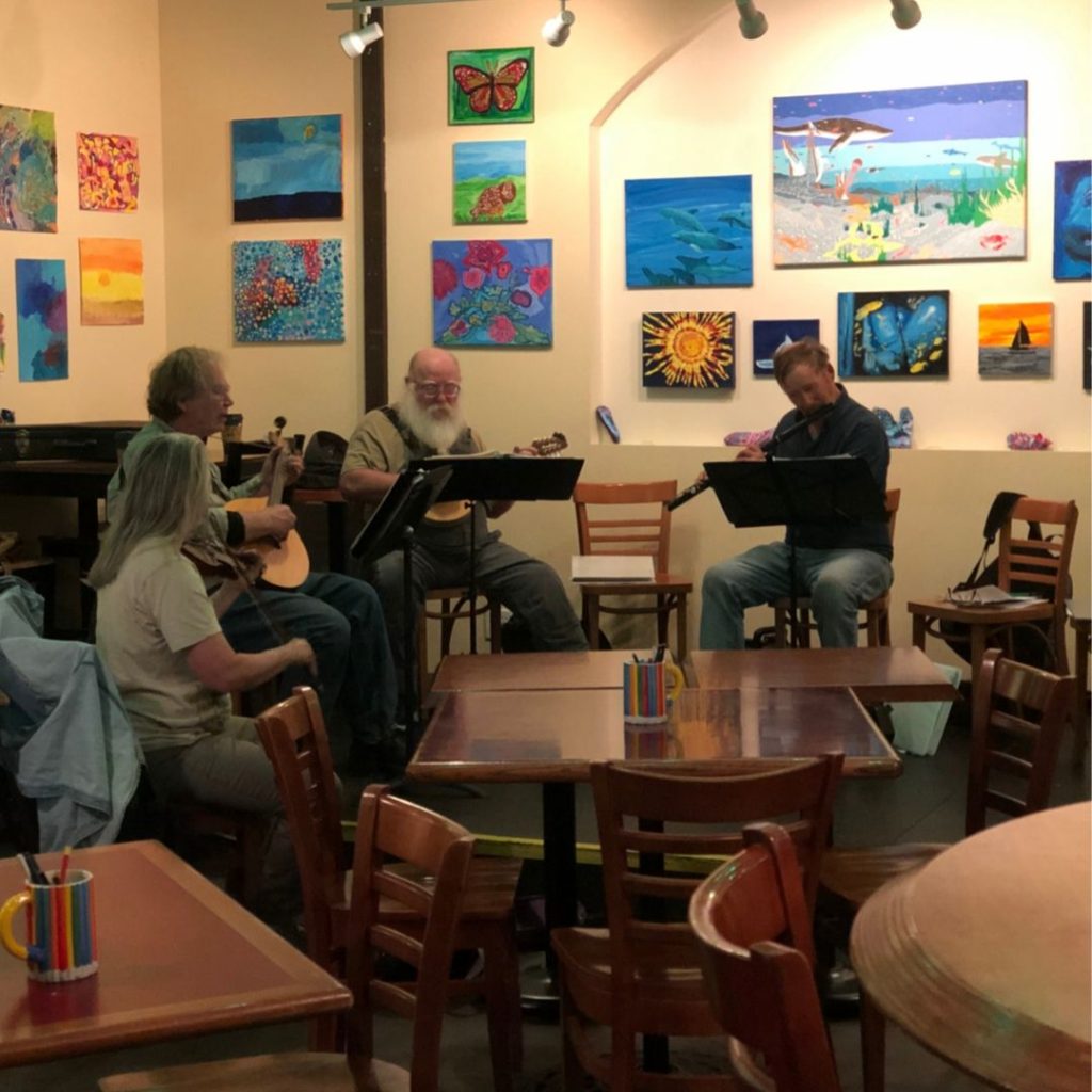 People playing Irish music at a local coffee shop