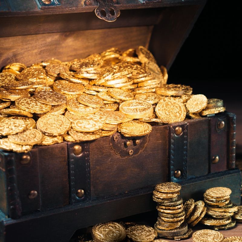 treasure box with gold coins representing energy flow through Akashic Records
