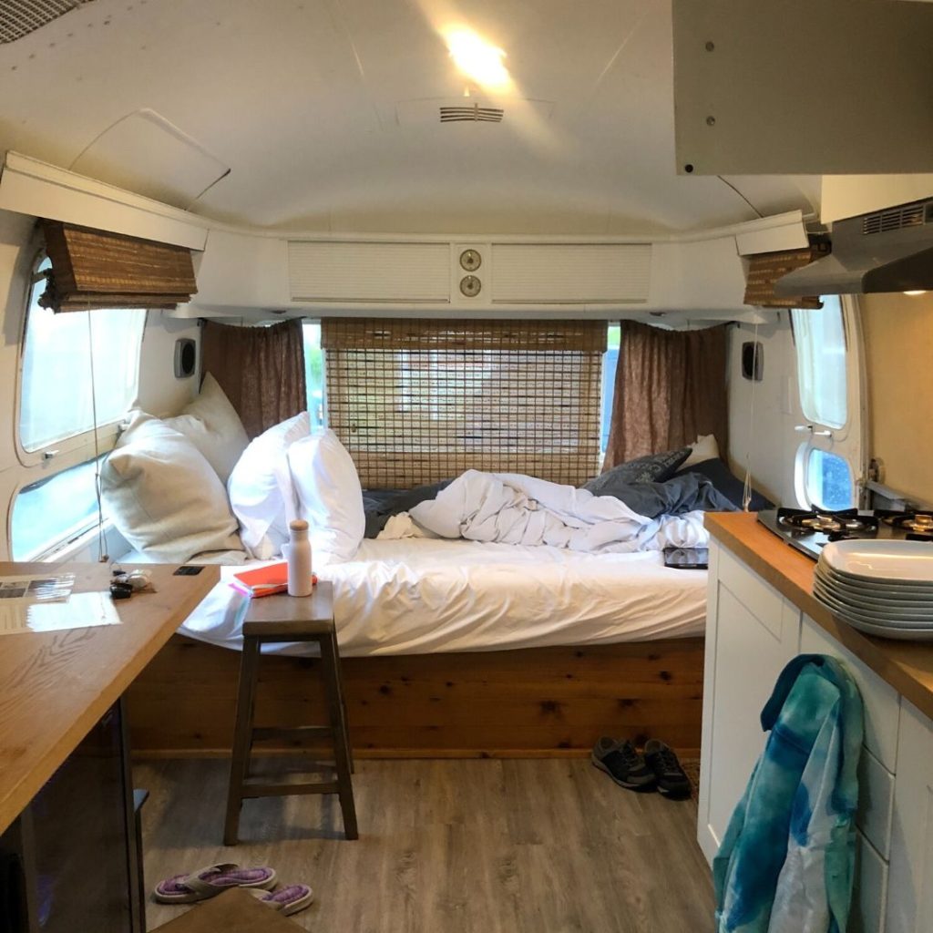 view of the bed inside the vintage airstream