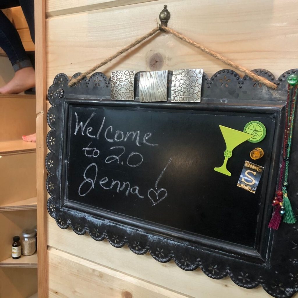 chalkboard with sign "Welcome Jenna"