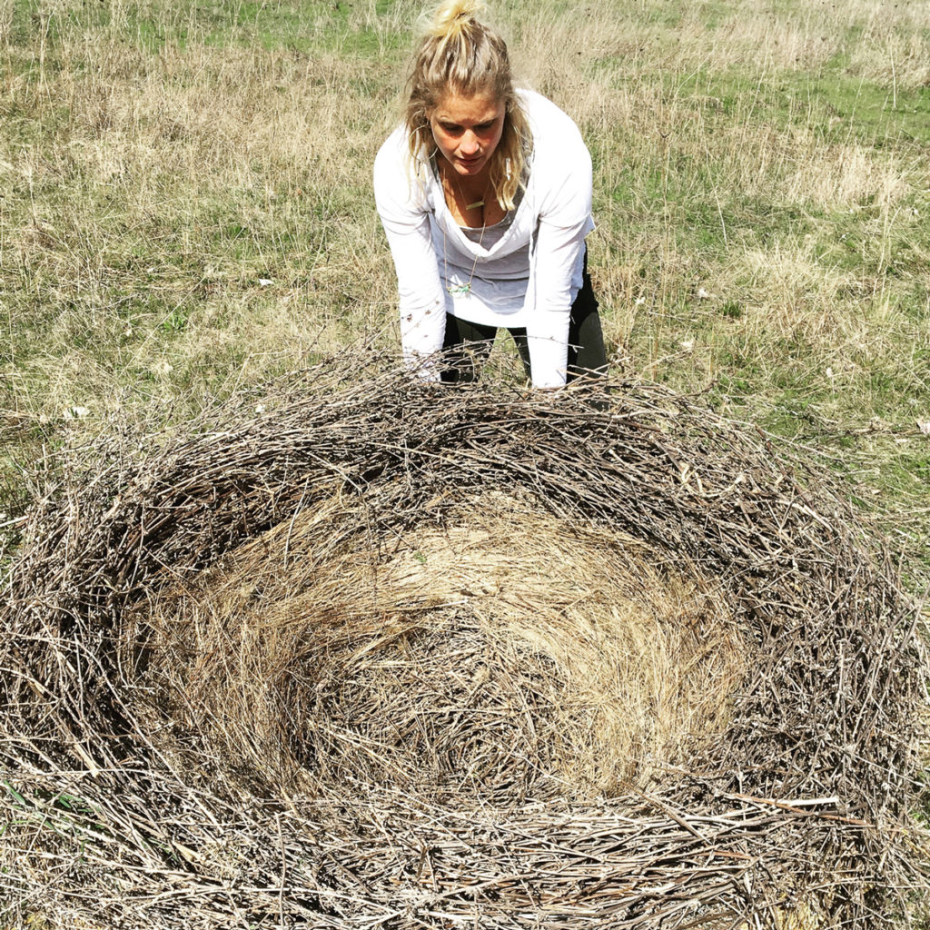 Debbie Baxter setting up a nest for a photo shoot for The Nest Project