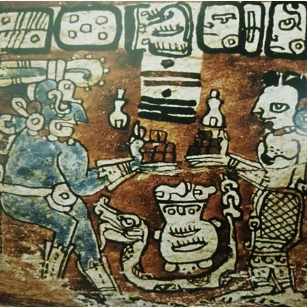 ancient Mayan illustration of two men having chocolate