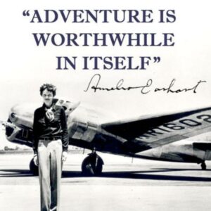 Be inspired by Amelia Earhart, in front of her plane 
