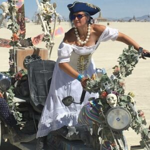 Artist Stacey as a pirate on unknown artist's trike