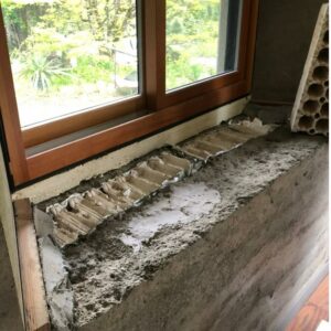 Window sill showing the interior of the insulation and thick walls