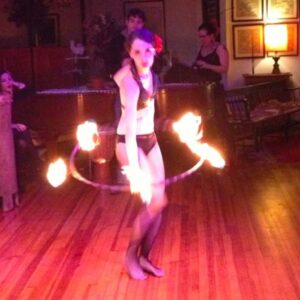 Fire dancer at Burning Man fundraiser event